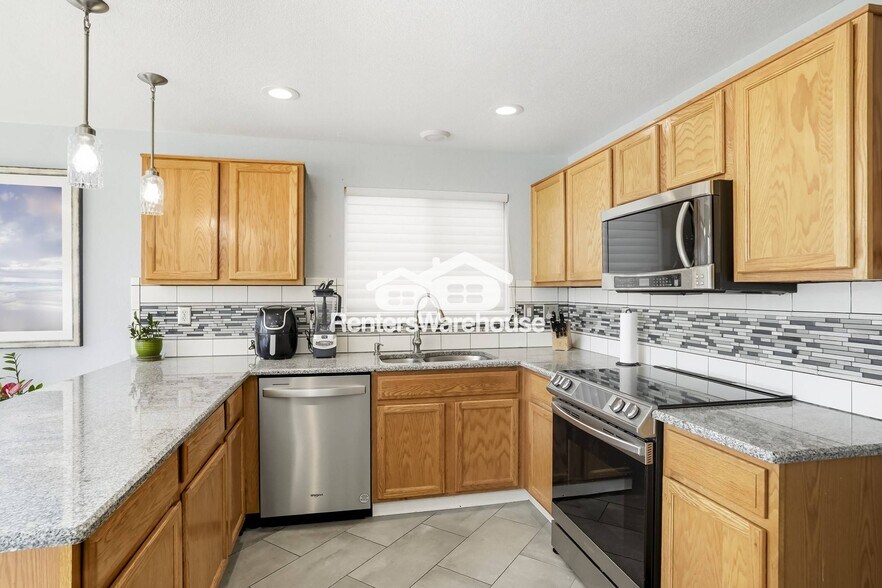 Building Photo - 6077 S Quatar Way