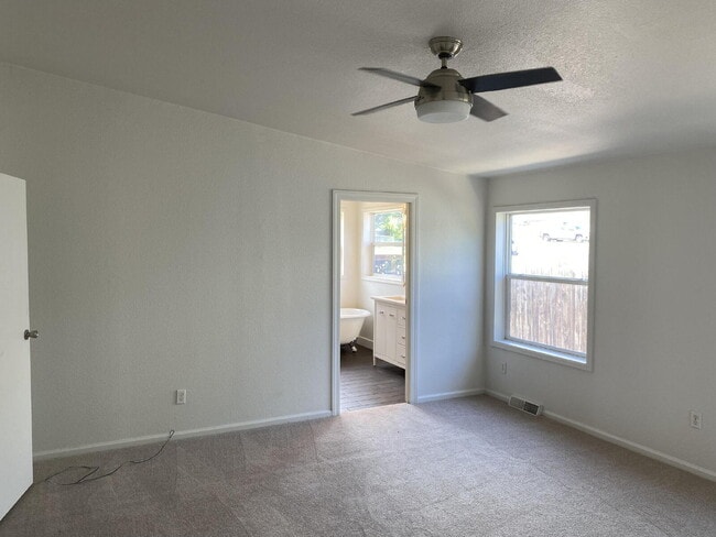 Building Photo - Available Now! "Spacious 3-Bedroom Retreat...