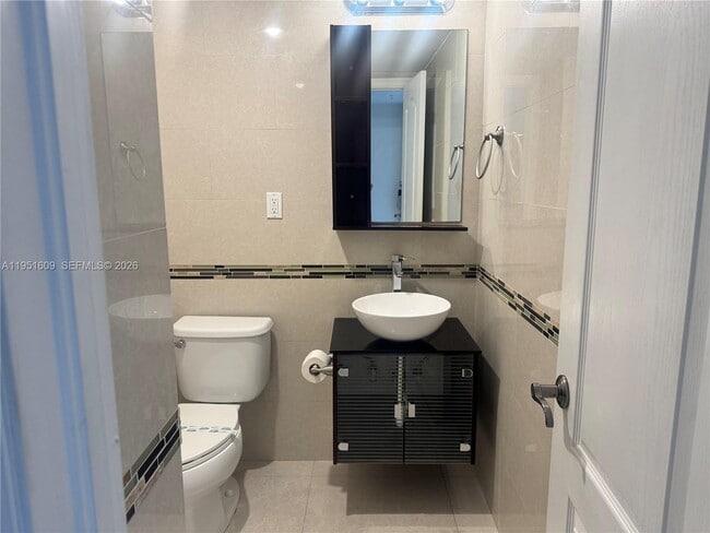 Building Photo - 19370 Collins Ave