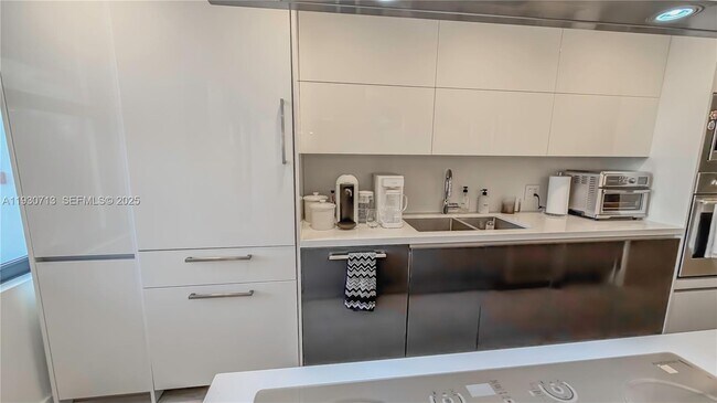 Building Photo - 9801 Collins Ave