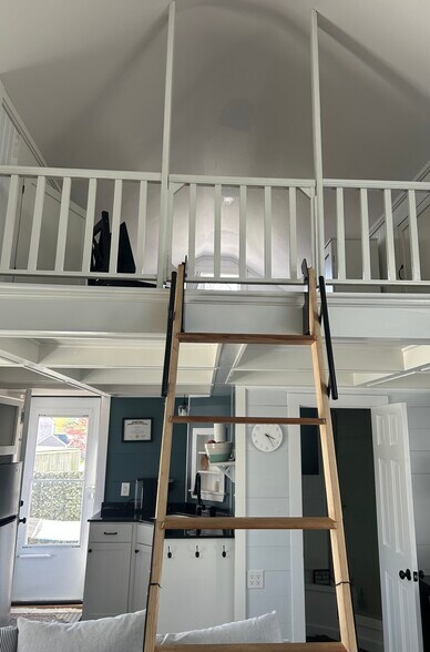 Retractable ladder leading to your cozy loft - 12 Howland Ave
