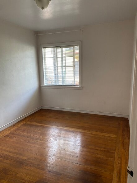 Sunny Bedroom-hardwood floors - 1329 Rose St