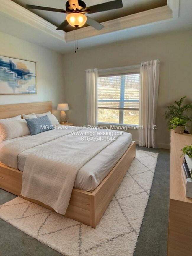 Building Photo - Location and Luxury Perfected in Parkville!