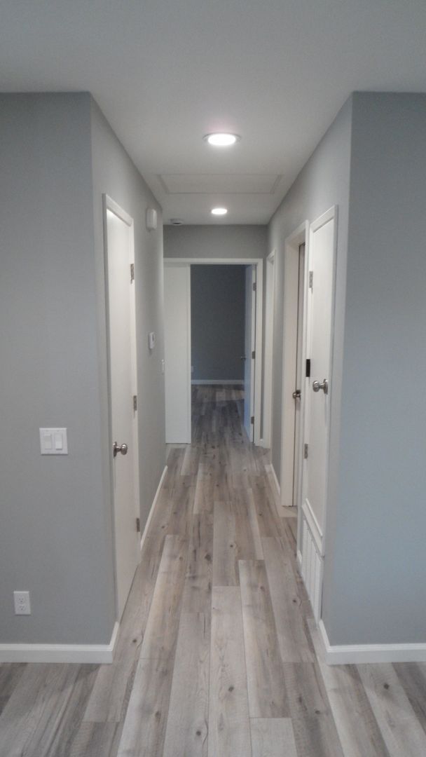 Building Photo - REMODELED 2BR; 1BA end unit condo w/ 1 car garage & 1 parking space