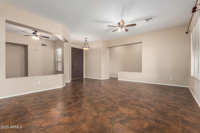Building Photo - 6923 W Lone Cactus Dr