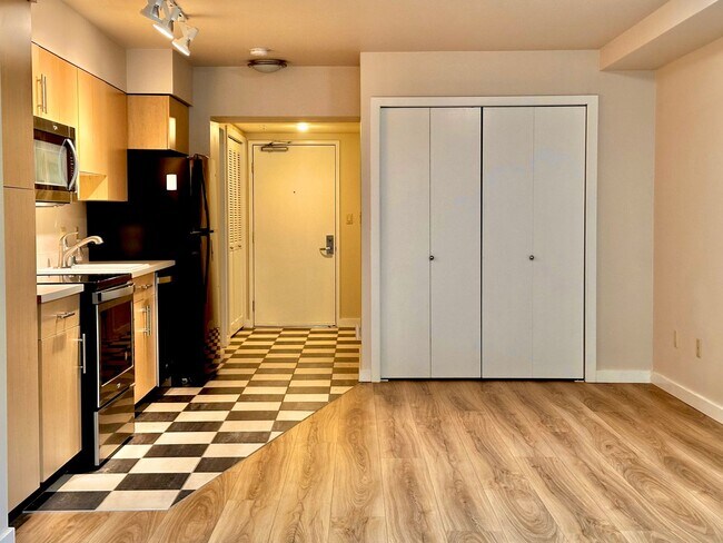 Building Photo - Downtown Bellevue Studio with Balcony, In-Unit Laundry & Amenities