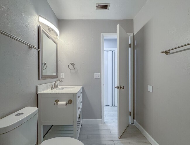 Building Photo - MODERN! Walk to FSU 2/2 w/ Marble Counters, Stainless Steel Appliances, & Privacy Fenced Yard! Av...