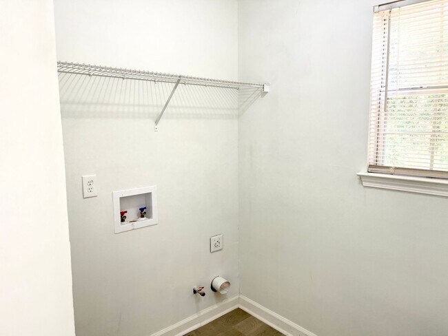 Building Photo - Welcome to this charming 3-bedroom, 2.5-bathroom home located in the desirable area of Ellenwood,...