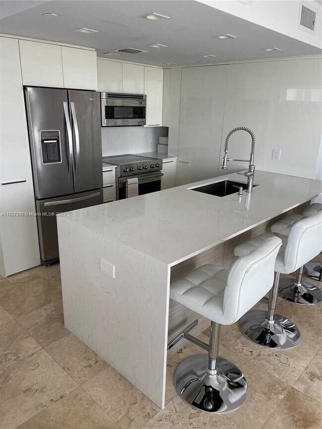 Building Photo - 8911 Collins Ave