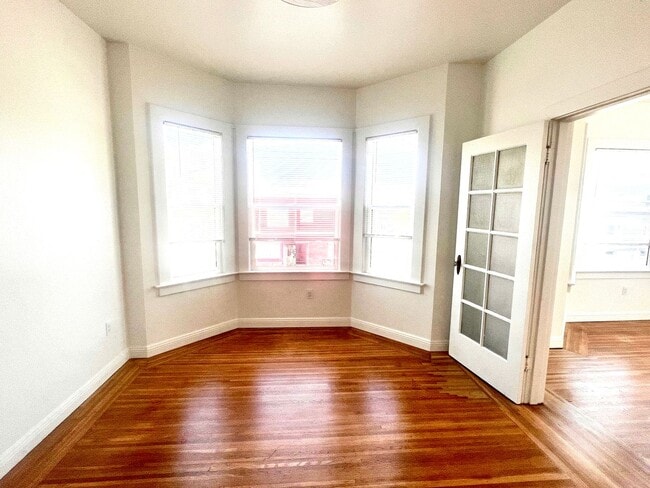 Building Photo - Fully Renovated Bright Corner Apartment wi...