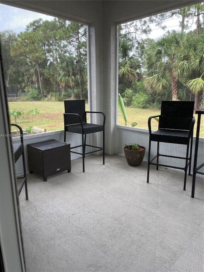 Building Photo - 6157 NW Gatun Dr