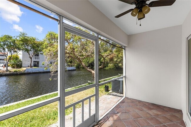 Building Photo - 1400 NE 57th Ct