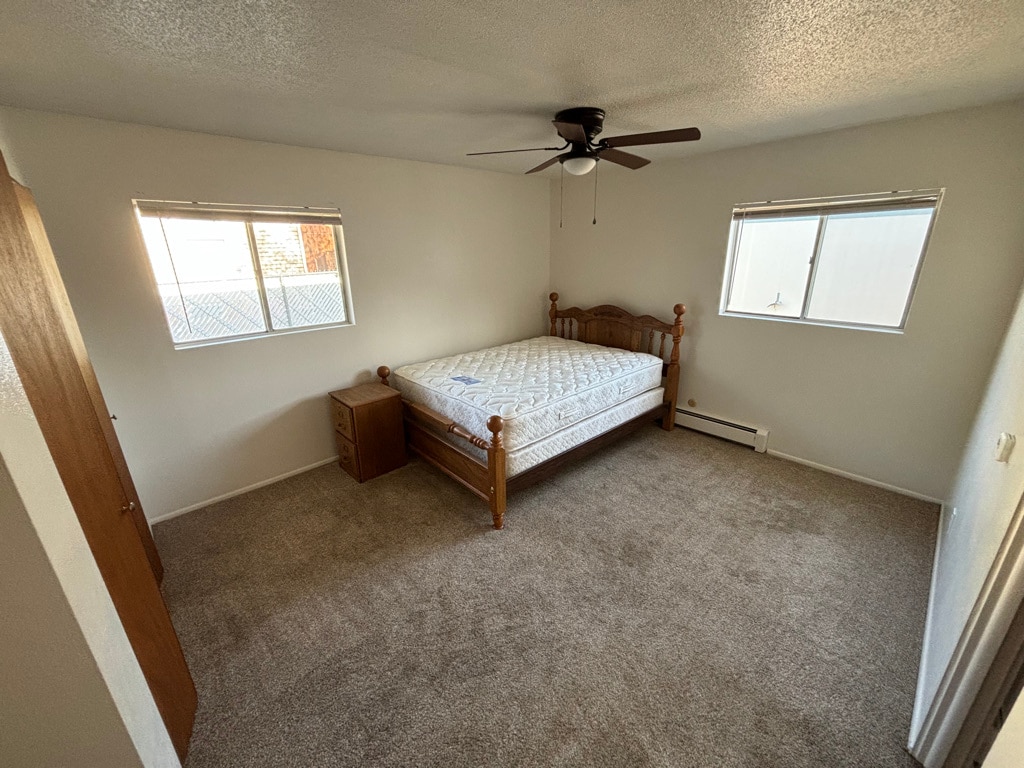 Large bedroom with oak bed frame, box spring and mattress available. - 1718 White Ave