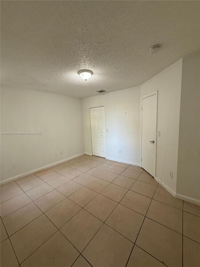 Building Photo - 18348 NW 68th Ave