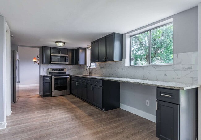 Building Photo - Minutes from UCF | Updated 4BR/3BA Home with Private Fenced Backyard
