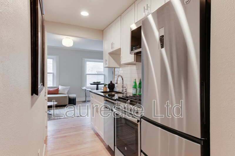 Building Photo - 1234 E Colfax Ave