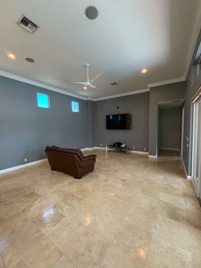 Building Photo - Spacious 3/3.5 3 car garage home in Palm City