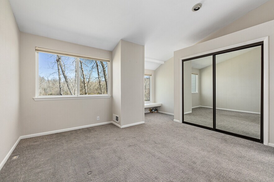 Primary bedroom overlooking the pond - 1927 S Teal Ln