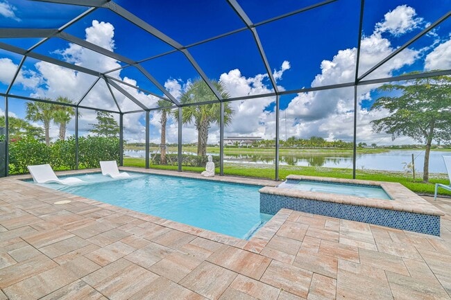 Building Photo - ** Single Family Home ~ Verdana Village ~ 3 Car Garage ~ Salt Water Pool & Lake Views **