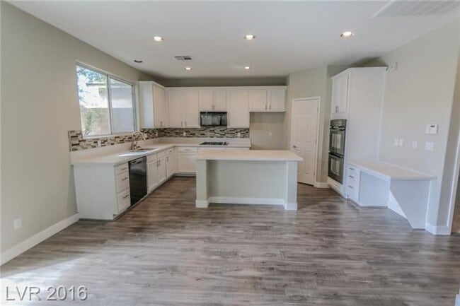 Building Photo - 9029 Blue Raven Ave