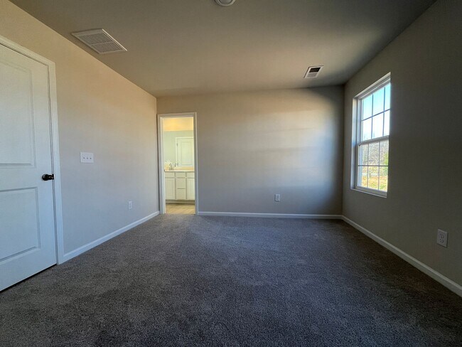Building Photo - Brand New 3/2.5 Townhome Available In Reidville - Ready To Move In!