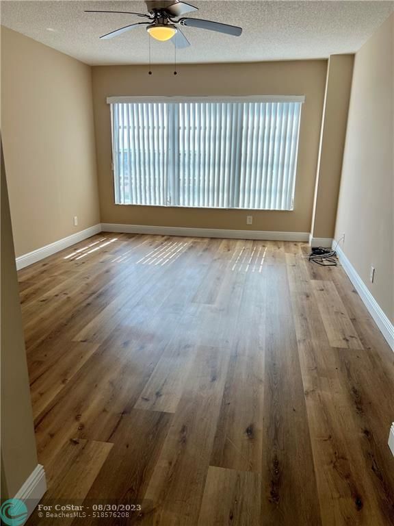 Building Photo - 10777 W Sample Rd