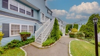 Building Photo - Beautiful 2 Bedroom Multi Level Condo