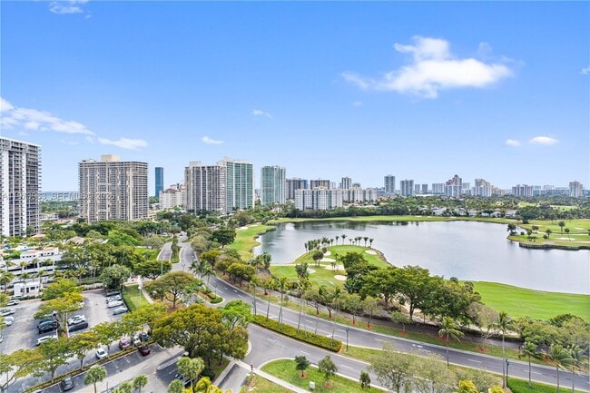 Building Photo - 3675 N Country Club Dr