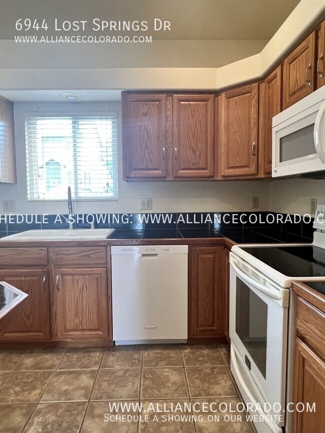 Building Photo - 6944 Lost Springs Dr