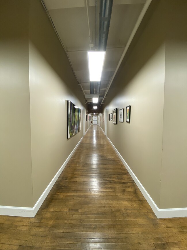 6th floor hallway with artwork - 901 Jefferson St