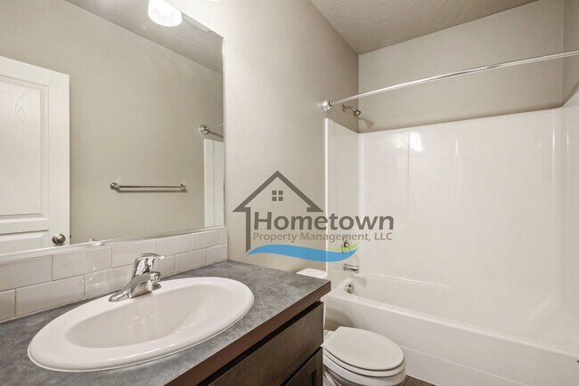 Building Photo - 3 Bedroom 2 Bath Home with 2-Car Attached ...