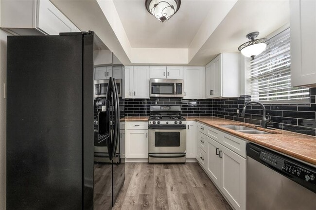 Building Photo - 6107 Bullard Dr