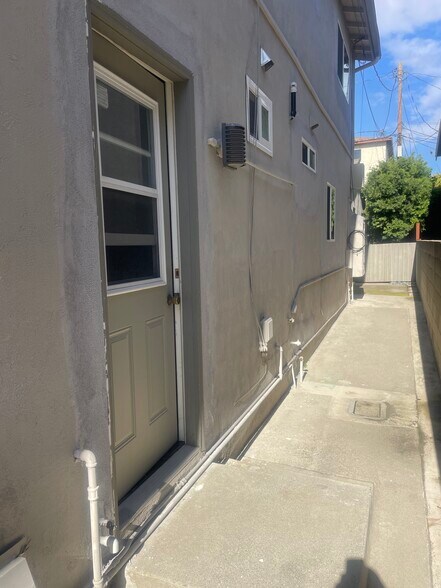 Door to coin laundry - 2703 Nelson Ave