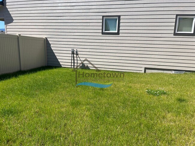 Building Photo - Woodbridge South Home with 4 Bedrooms and 3 Bathrooms in Post Falls build in 2021!