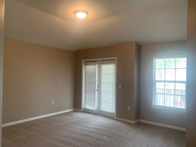 Building Photo - MOVE IN SPECIAL- 3/2 Condo w/ 2 Car Garage in Harmony, FL