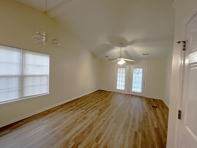 Building Photo - Updated flooring, McClelland Town homes 2BR/2Bath one level patio home, with back court yard! Clo...