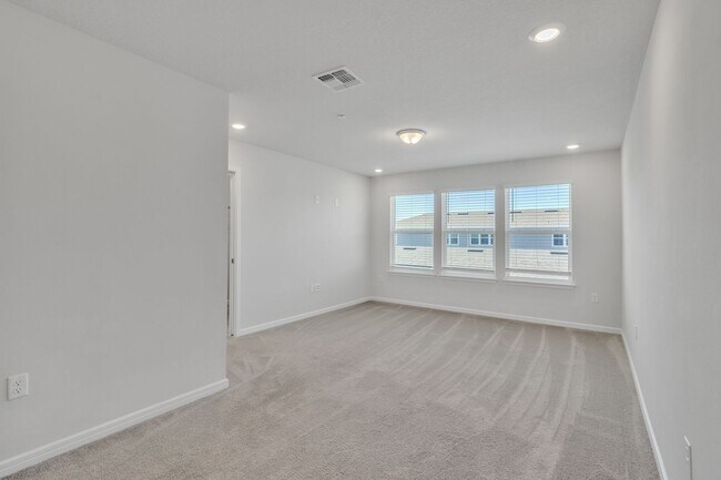 Building Photo - Luxurious Townhome in Lake Nona - A Perfec...