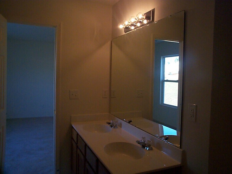 Master bathroom Note this pic was taken before the walls were painted. - 6434 Ziegler Ln