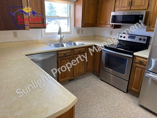 Building Photo - "Charming 2-Bed, 2-Bath Retreat in Laurel, MT – Your Perfect 1148 Sq Ft Haven on 5th Ave Awaits!"