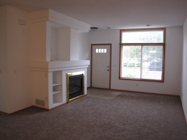Building Photo - Townhome with Loft, Fireplace & Large Walk-In Closet. Trash and water included– Available May 1