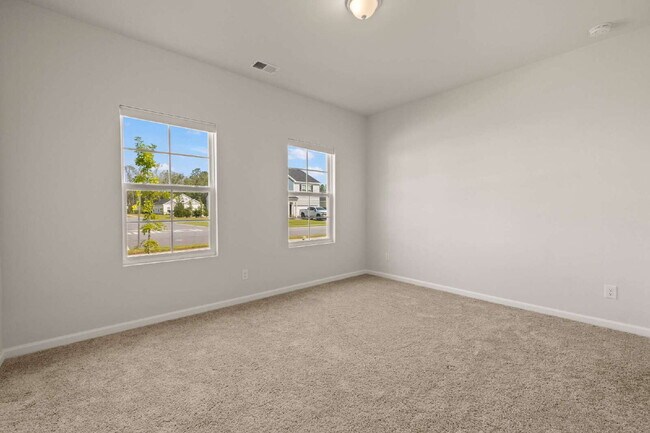 Building Photo - "Charming 3-Bed 2-Bath Residence in Telfai...