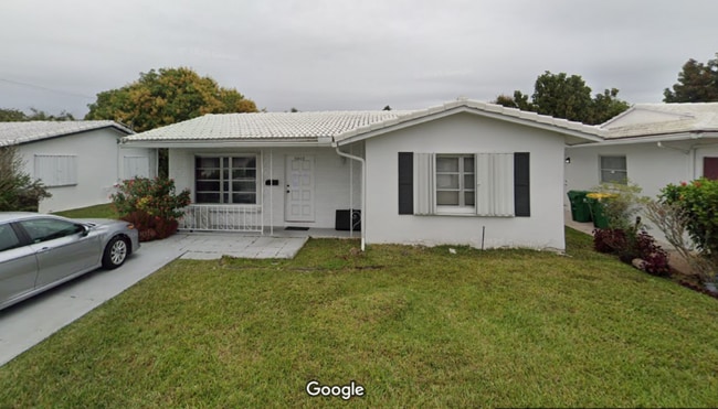 Building Photo - 8409 NW 59th Ct