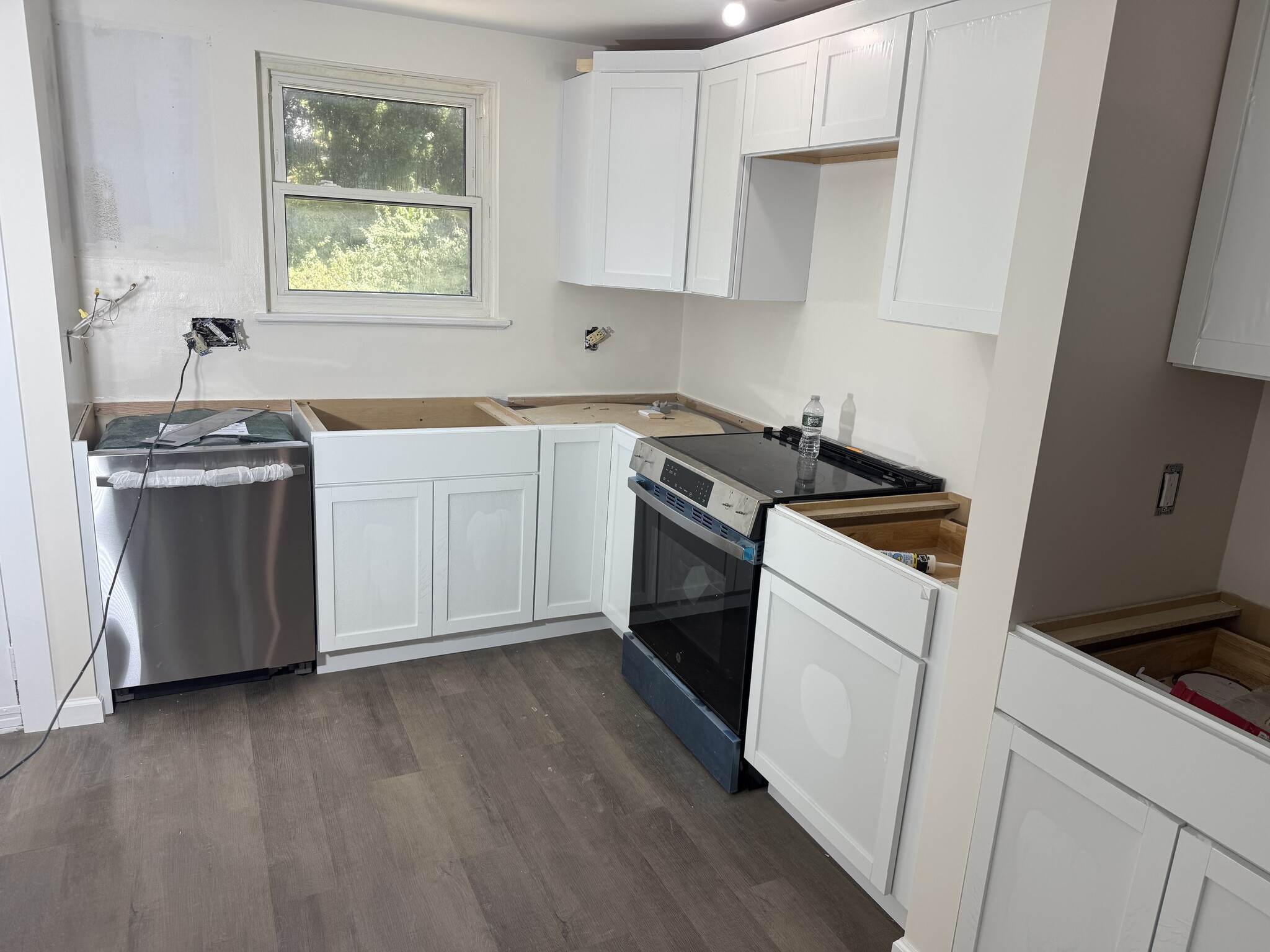 Brand new cabinets being installed and put a quartz on the top. All brand new appliances from Costco - 36 Chestnut Hls