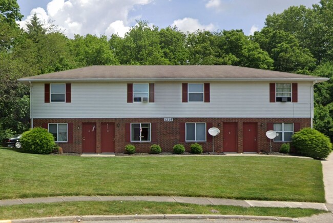 Building Photo - Spacious 2-Bedroom Living in a Quiet Commu...