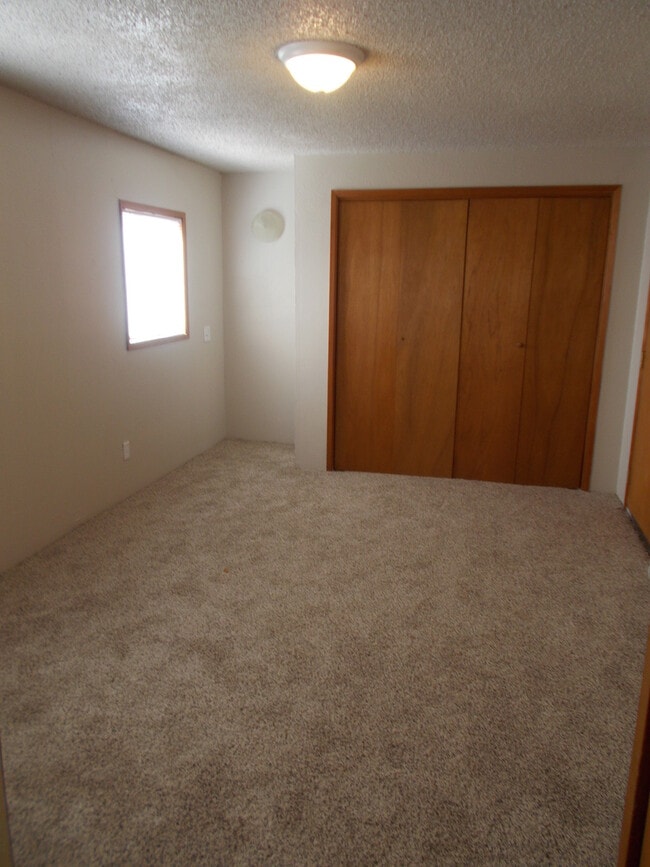 Building Photo - 2 Bedroom, 1 Bath house with a Huge Backyard!