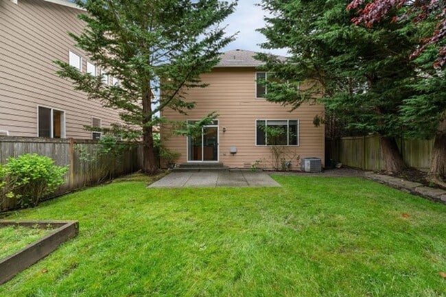 Building Photo - A Beautiful Picture Perfect Home with 4 Be...