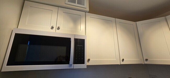 Building Photo - Everything is new! Harvard Sq! Walk to T! Large 1bd with balcony! Parking included!