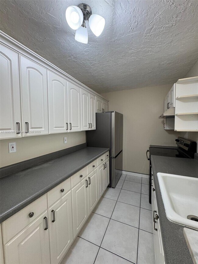 Building Photo - 10500 SW 108th Ave