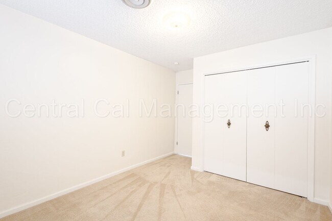 Building Photo - 3 Bedroom/2 Bath with a Pool - $2295 Per Month!