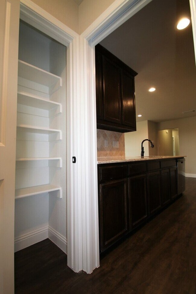 Building Photo - No Water Bill. No Lawn Care. Just Move In. | 3BD/2BA Duplex in Weatherford TX | Ready Now — Act F...